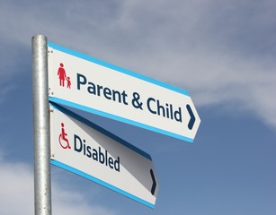 A disabled and Parent & child parking sign