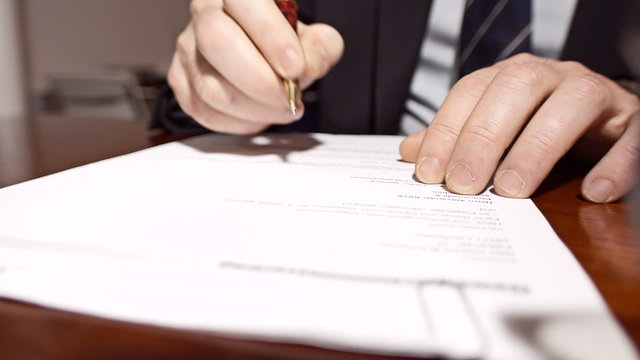 Businessman signs a contract