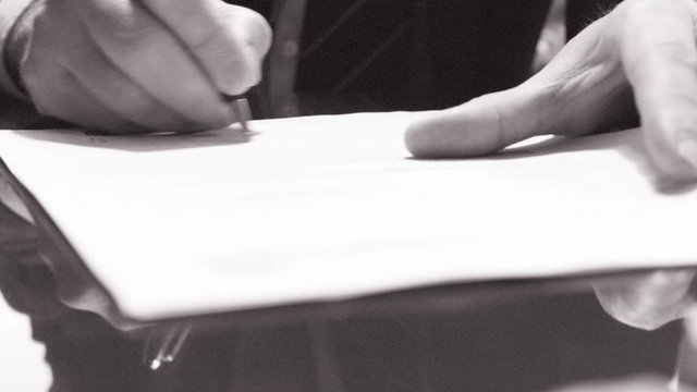 Businessman signing a contract