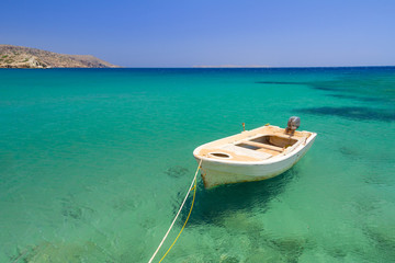 Boat on the blue lagoon of Vai beach, Crete