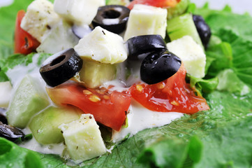 salat with feta cheese and fresh vegetables