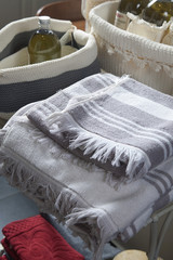 Fototapeta na wymiar Colourful towels in a shelf.