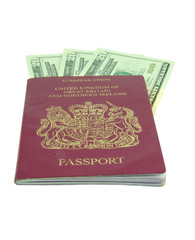 british passport and dollars isolated on white