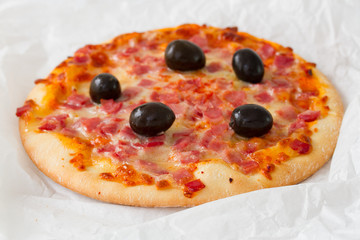 pizza on white paper