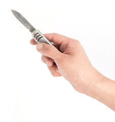 Knife in a hand with isolated over white