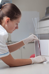 Woman doctor doing erythrocyte sedimentation rate test