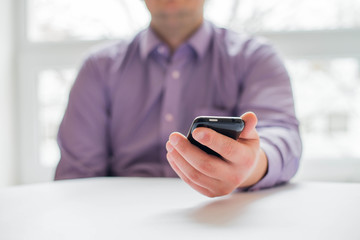 Man holding a mobile phone