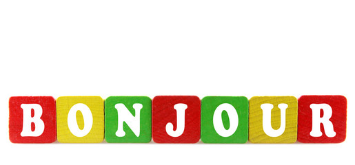 bonjour - isolated text in wooden building blocks © Nenov Brothers