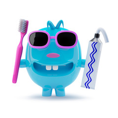 Little blue alien toy in sunglasses brushes his teeth