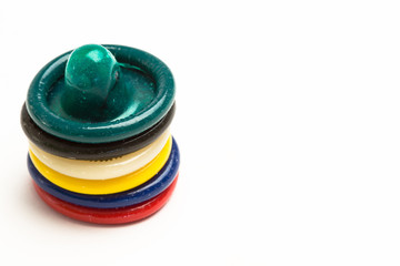 Stack of colourful condoms