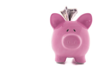 Dollar note stuck in piggy bank