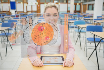 Front view of a student with a tablet looking at futuristic inte