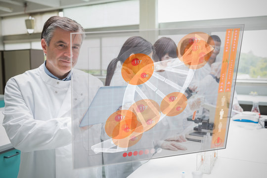 Confident scientist working with tablet and futuristic interface