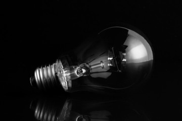 Clear light bulb lying on its side