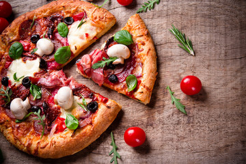 Delicious italian pizza served on wooden table