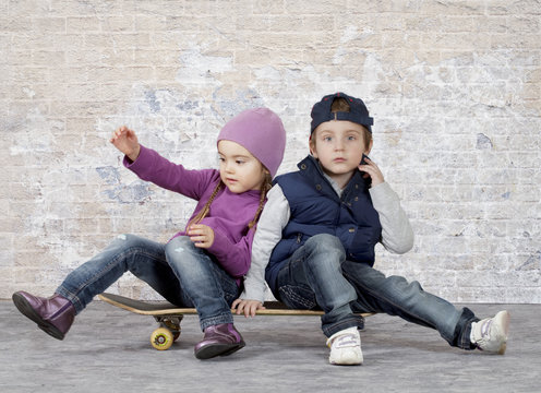 Kids on a skateboard