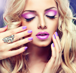 Beautiful blonde girl with lilac makeup