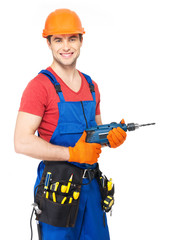 Portrait of smiling handyman with tools