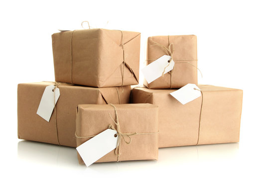 parcels boxes with kraft paper, isolated on white