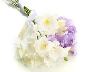 Beautiful bouquet of freesias, isolated on white