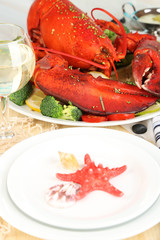 Red lobster on platter on serving table close-up