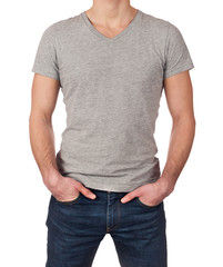 Grey t-shirt on a young man isolated on white background