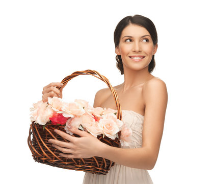 woman with basket full of flowers