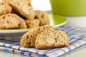 Aromatic cookies cantuccini and cup of coffee isolated on white