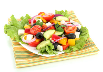 Tasty Greek salad isolated on white