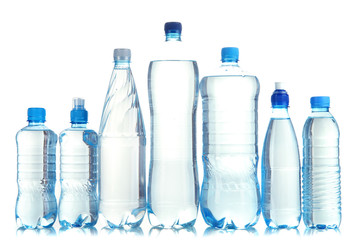 Different water bottles isolated on white