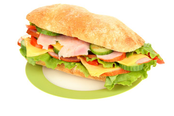 Fresh and tasty sandwich with ham and vegetables isolated