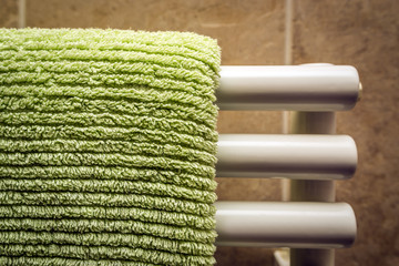 Green towel on radiator