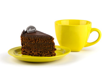 Chocolate cake on a yellow plate