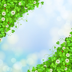 Blue sky background with clover