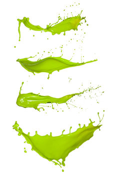Shot of green paint splashes, isolated on white background