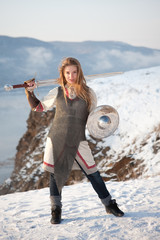 Girl in armor with a sword knight