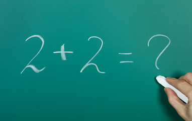 Hand writing 2 plus 2