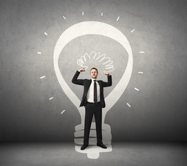 businessman and lamp drawn on the wall