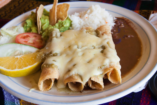 Enchiladas with cheese and beans