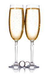 Champagne and wedding rings