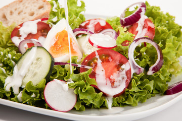 Delicious mixed salad with a dressing