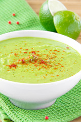 Velvety cream soup from a gentle green peas with paprika