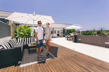 Attractive couple on balcony
