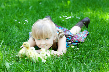 Girls play with chicken and duck