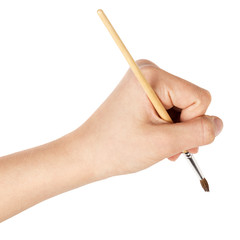 female teen hand with a brush