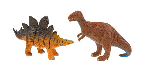 Plastic stegosaurus and tyrannosaurus