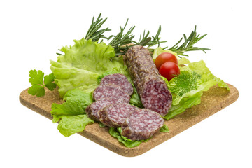 Salami with rosemary, salad and tomatoes