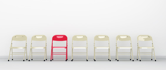 Standing out among others. Red chair standing out