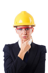Young businesswoman with hard hat on white