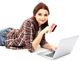 Fototapeta premium Beautiful young woman with laptop isolated on white